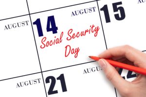 Calendar that shows August 14th and says social security day